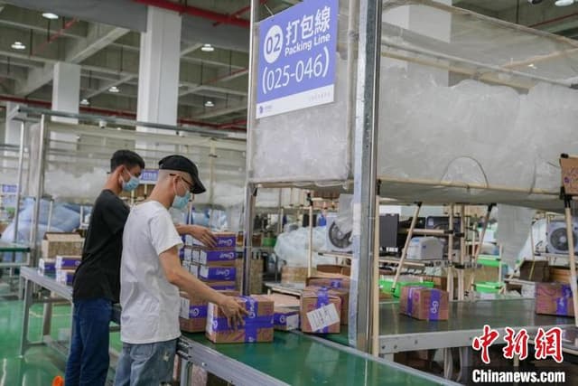 广州南沙疫情趋稳:社区重燃烟火气 港区生产常态化